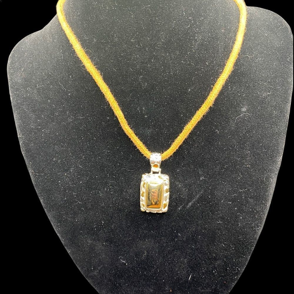Rectangle gold and silver tone pendant with leopard spots brown adjustable cord